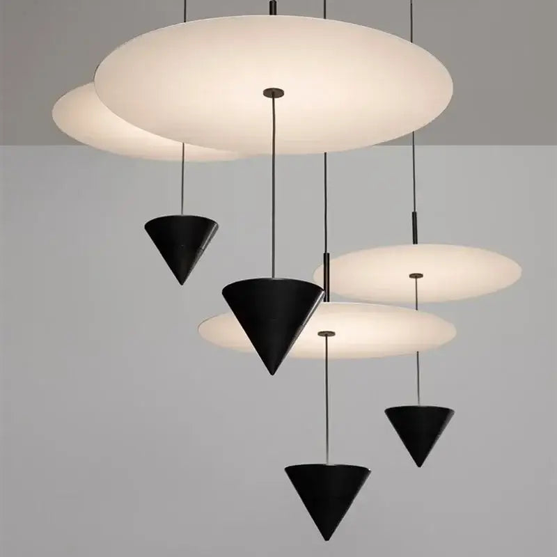 Modern decorbites led pendant lights featuring matte black conical shades and white diffused circular discs chandelier