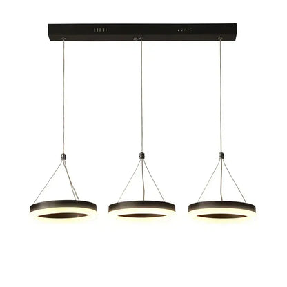 Modern black DecorBites LED pendant lights feature three illuminated acrylic rings suspended from a sleek ceiling mount