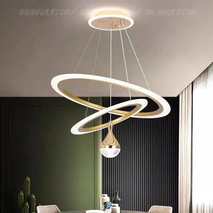 Modern gold and white double-ring LED pendant light with teardrop-shaped decorbites LED pendant for living room decor