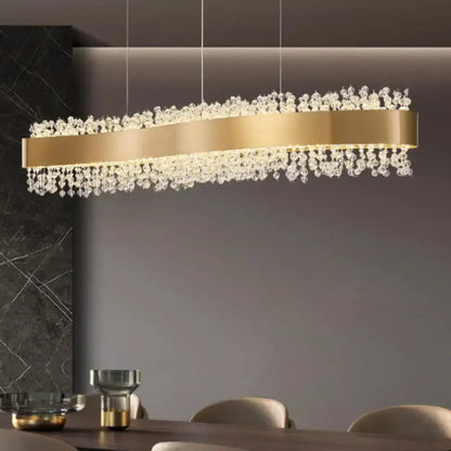 Gold-toned decorbites led pendant lights featuring clear crystal droplets for modern bedroom and hotel decor