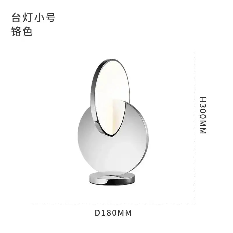 A sleek decorbites led pendant light with two overlapping circular glass shades in polished chrome for home decoration