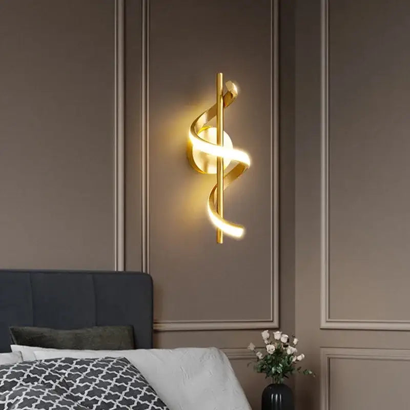 Gold-toned spiral wall lamp with sleek modern design from DecorBites led pendant lights for nordic home decor