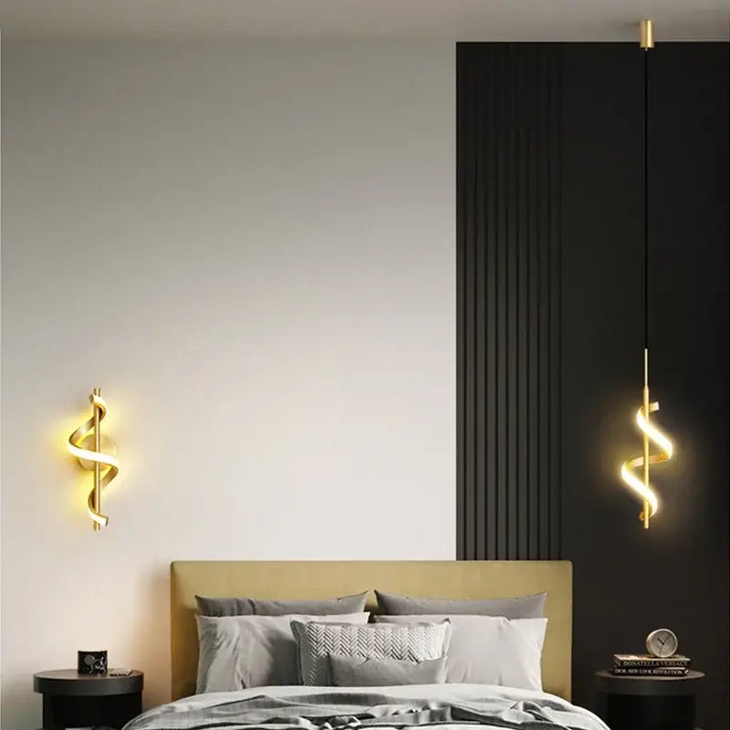 Gold spiral wall sconce with sleek modern design from DecorBites led pendant lights and wall lamps collection