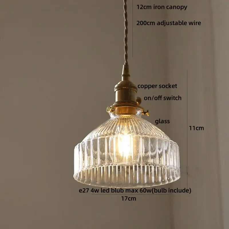 A clear ribbed glass pendant light with brass copper socket and iron canopy from DecorBites led pendant lights