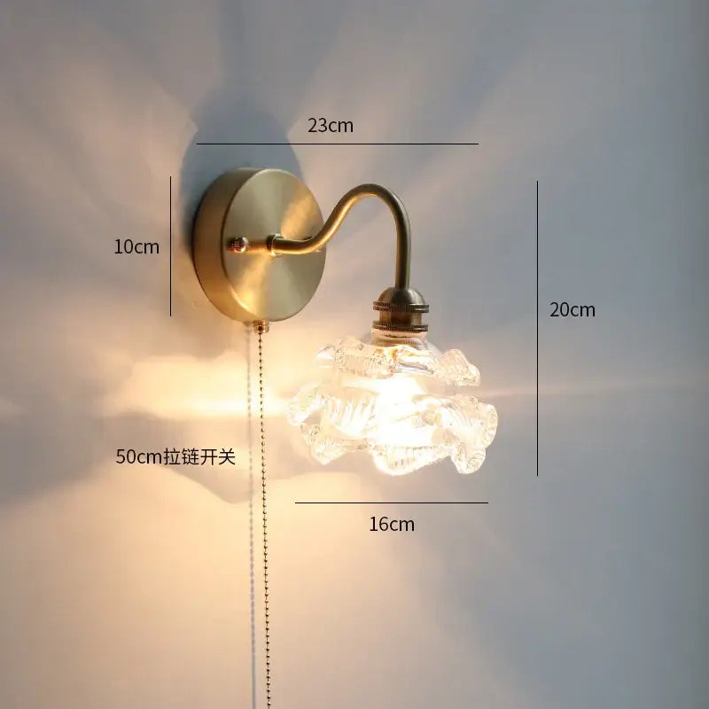 Brass-finished decorbites led petal wall sconce with clear textured glass shade and 50cm pull-chain switch for stairs