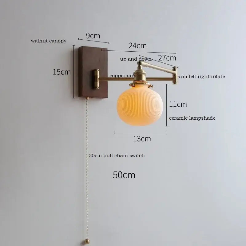Warm-toned ceramic wall lamp with ribbed texture on adjustable copper arm decorbites led pull chain sconce