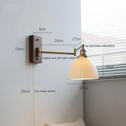 Adjustable copper-arm wall lamp with ribbed off-white glass shade featuring pull chain by DecorBites LED pull for bedroom