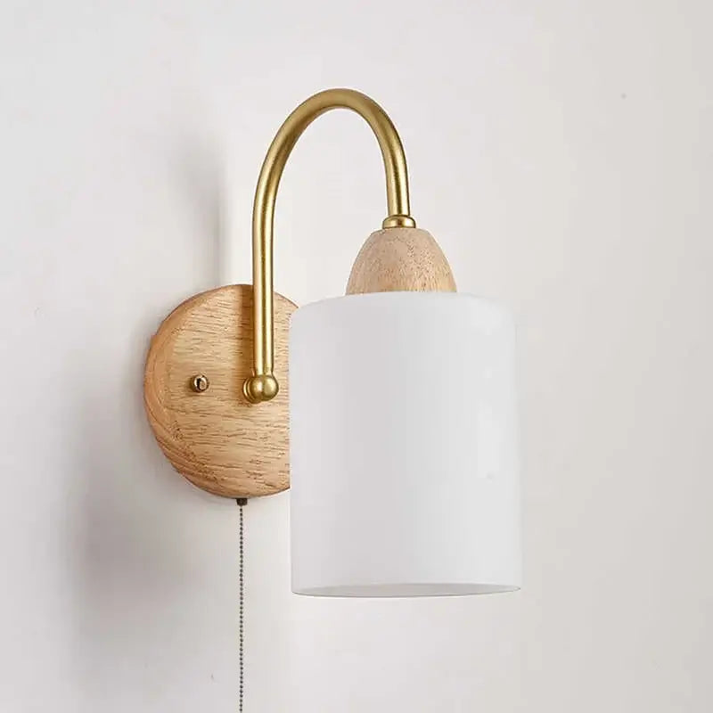 Minimalist decorbites led pull wall light with brass arm, light wood backplate, wooden accent, and matte white shade