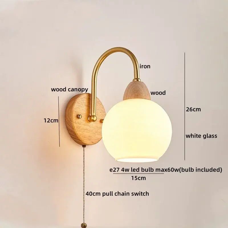 Warm-toned decorbites led pull chain wall lights with brass iron arm wooden base and frosted glass globe for bedroom decor