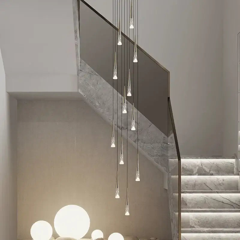 Modern minimalist pendant light with slender metallic rods and clear crystal droplets by DecorBites LED Rain Drop
