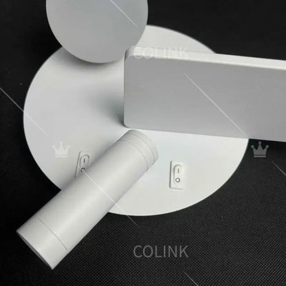 White minimalist decorbites led reading wall lamp with sleek cylindrical and rectangular components and usb charging