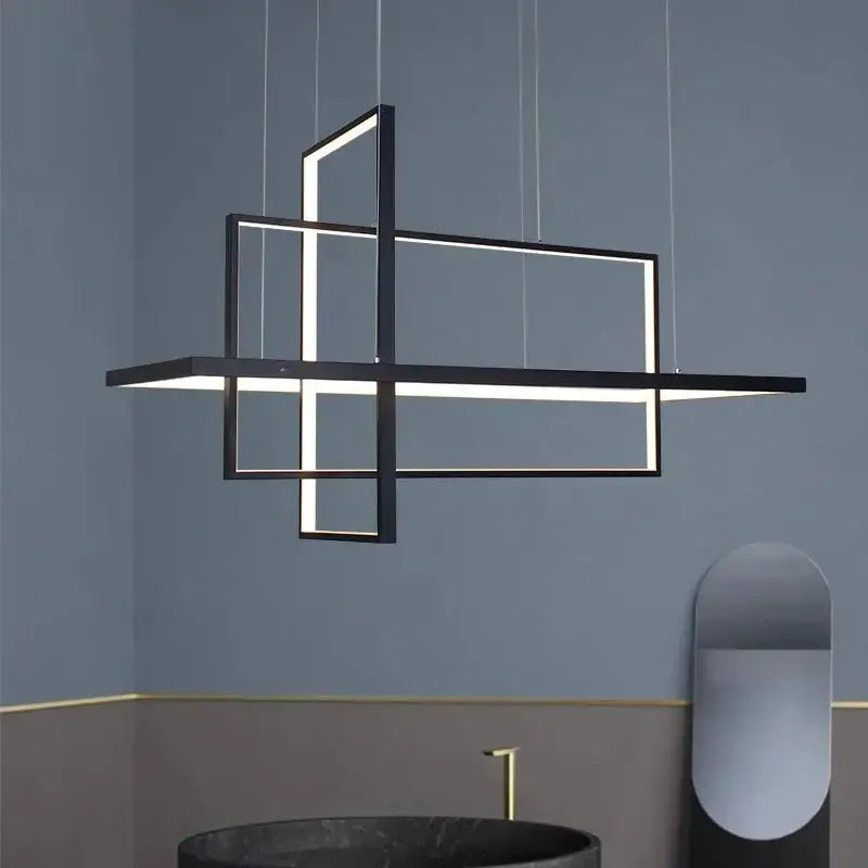 Modern black-framed DecorBites™ LED rectangle pendant lights with illuminated panels for dining room and kitchen use