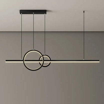 Modern black and gold metal led restaurant island pendant with two warm white glowing circular rings suspended