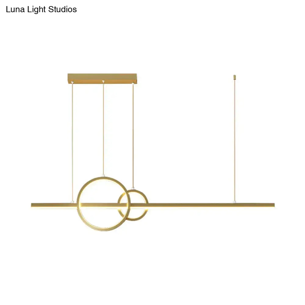 Modern gold-toned led restaurant island pendant with intersecting rings and warm white lighting by DecorBites™