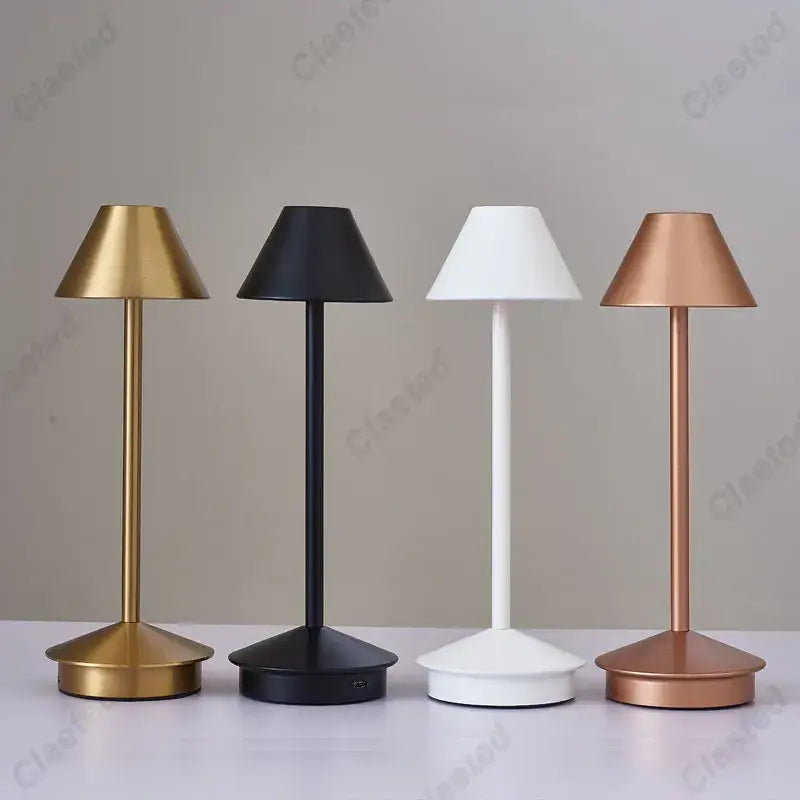 Four DecorBites led retro touch table lamps in gold, black, white, and rose gold with metallic stems and conical shades