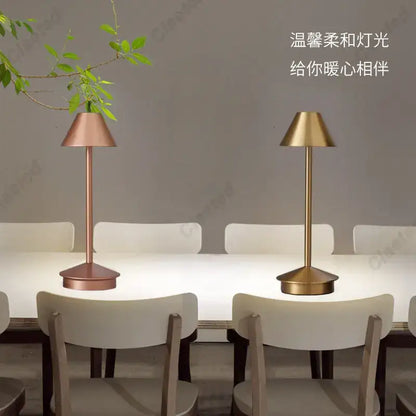 Two modern decorbites led retro touch table lamps with slender metallic stems in rose gold and brass conical shades
