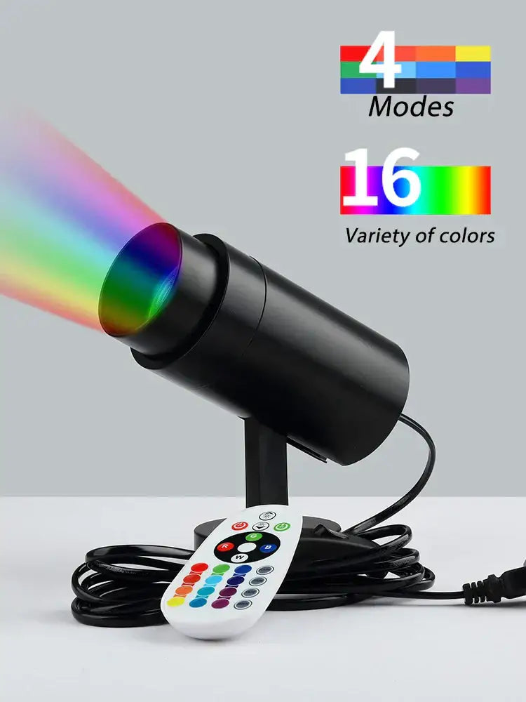 Black cylindrical decorbites led rgb spotlight with remote control featuring color buttons for ktv bar disco lighting