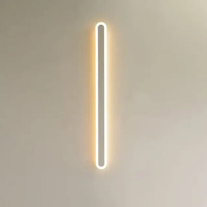 A sleek vertical decorbites led rgb wall light with minimalist design and warm white illumination for indoor decor