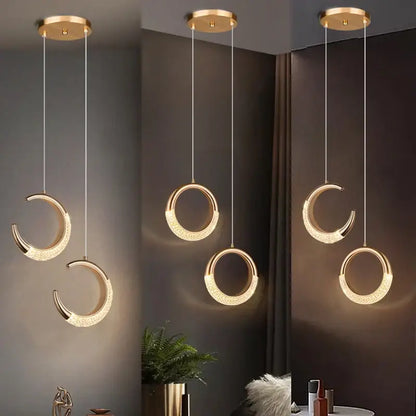 Gold-toned crescent pendant light with embedded led ring lighting and textured finish from DecorBites moon lamps set
