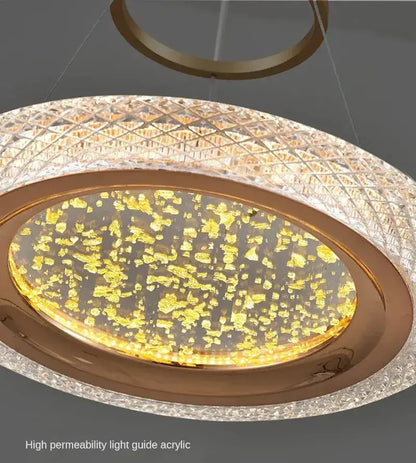 DecorBites™ gold-toned led ring chandelier with textured acrylic diffuser and golden leaf accents for luxury living room lighting