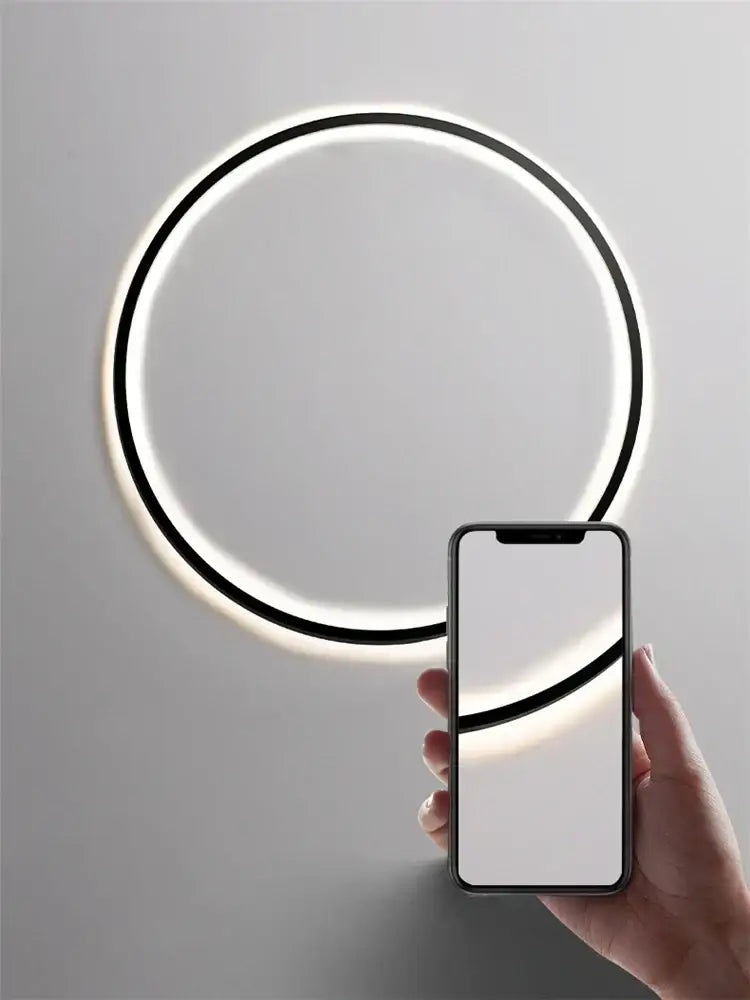Decorbites™ led ring wall lamp with sleek black frame and soft white illumination for minimalist living room decor
