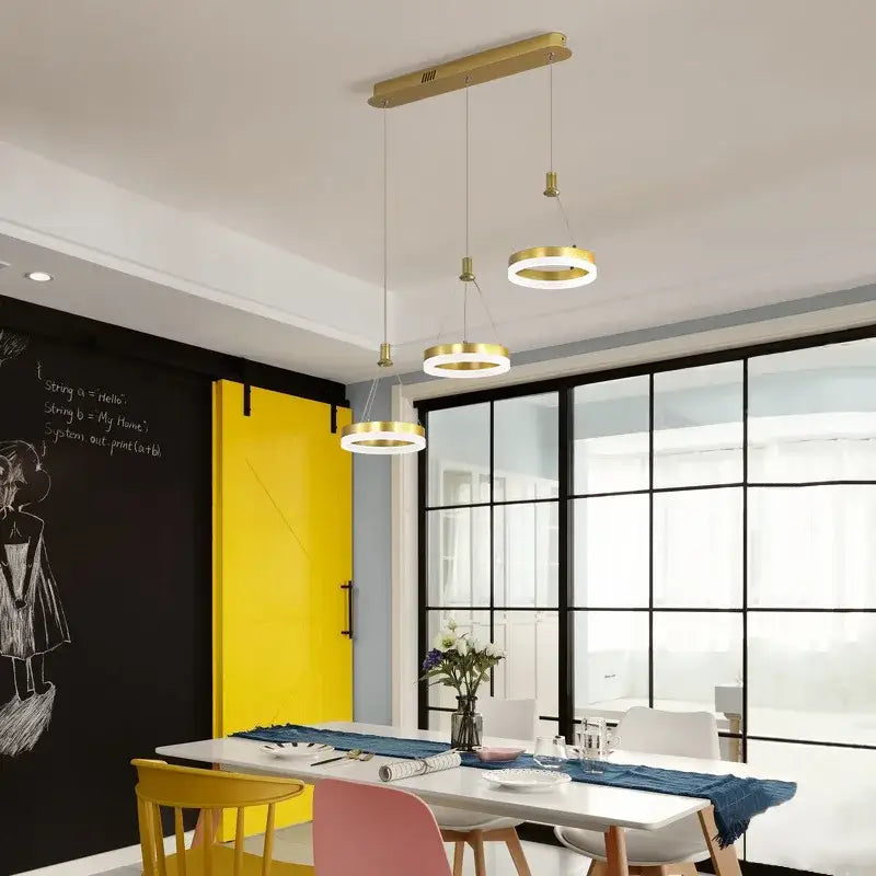 Modern gold-toned decorbites led rings ceiling chandelier with circular shades for dimmable indoor living room lighting