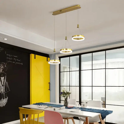 Modern gold-toned decorbites led rings ceiling chandelier with circular shades for dimmable indoor living room lighting