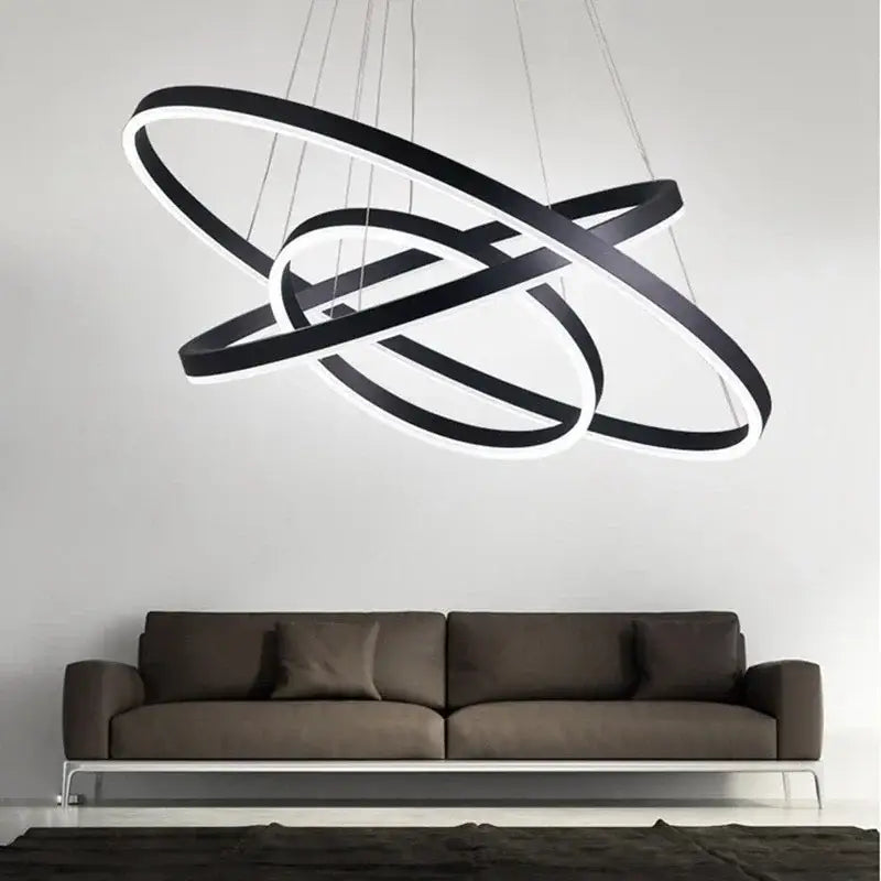 Modern black and white led rings chandelier with sleek interlocking circular design for living room and dining room lighting