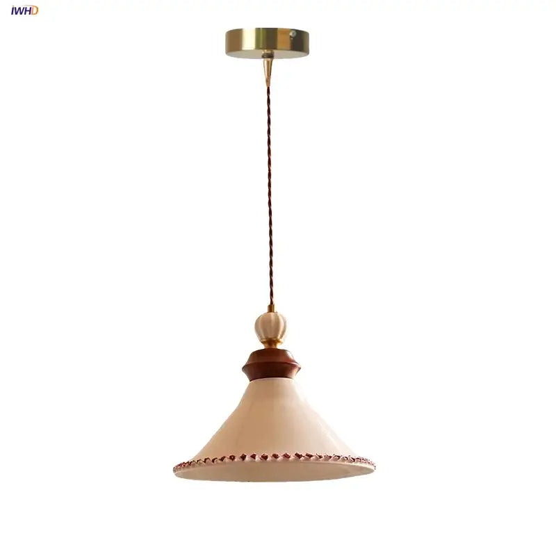 Cream-colored ceramic led rose flower pendant lamp with wooden accent and decorative beaded trim for modern decor
