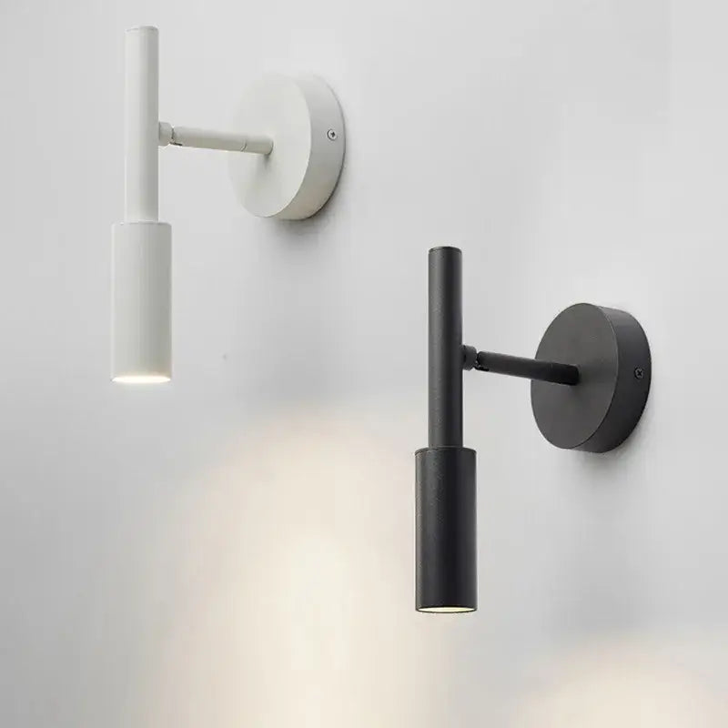 DecorBites™ led rotatable wall lamp in white and matte black with cylindrical shades and circular mounting plates