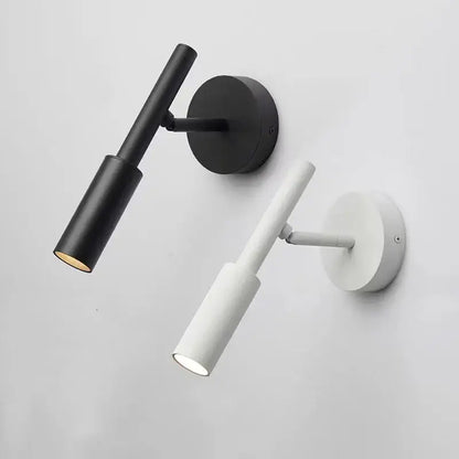 Modern black and white metal decorbites led rotatable wall lamp with sleek cylindrical design for reading use