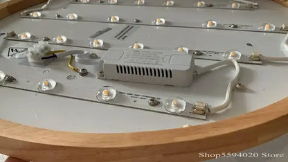 Back view of white rectangular led driver with ventilation slots mounted on dekorbites™ ultra-thin led round ceiling light panel