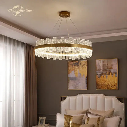 Decorbites led round glass chandelier featuring gold-toned stainless steel and crystal cylinders for bedroom and living room