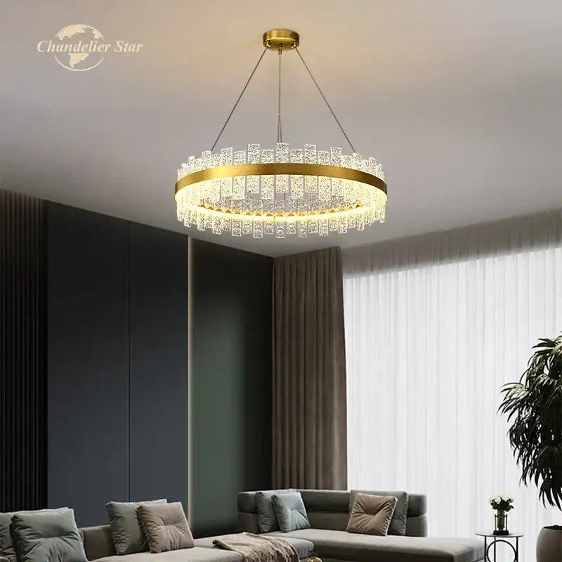 Decorbites led round glass chandelier with gold-toned circular frame and cascading crystal prisms for modern interiors