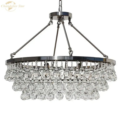 Chrome-finished decorbites led round glass chandelier with clear teardrop crystals pendant lights for modern living spaces