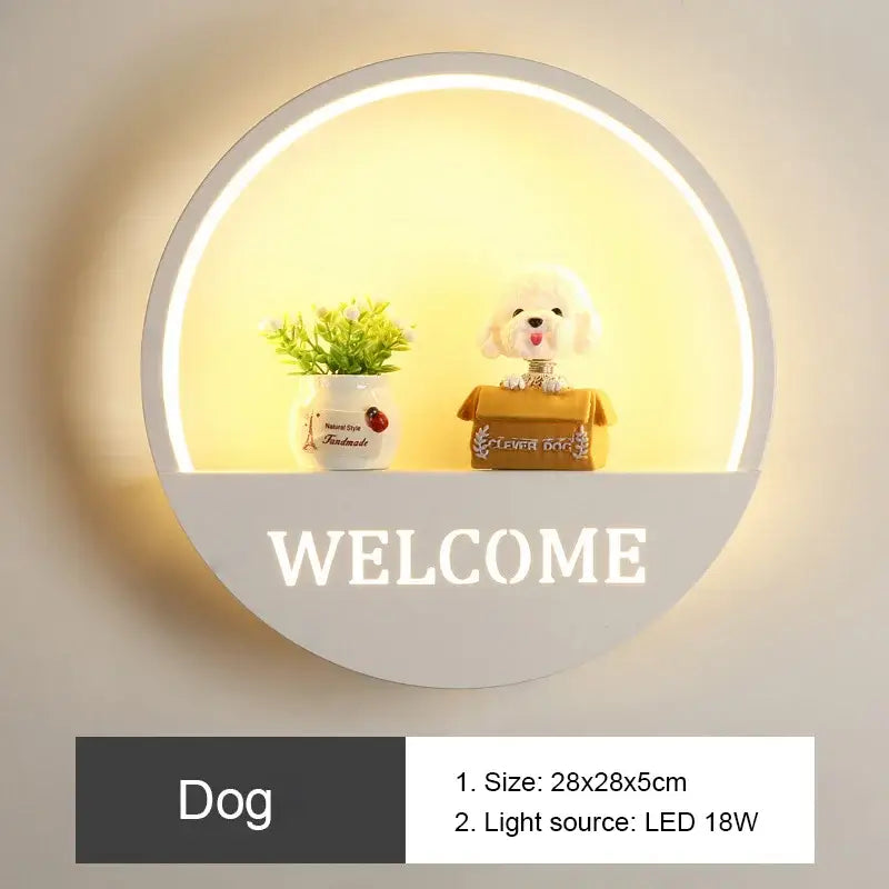 White circular DecorBites LED round wall lamp with illuminated shelf displaying plant and plush dog for children room lighting