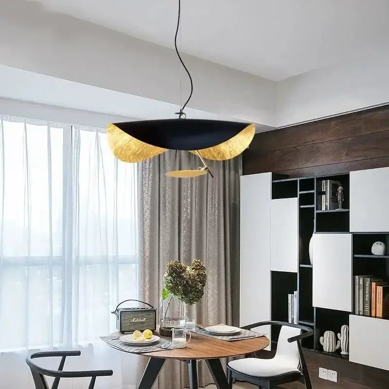 Black and gold leaf-shaped pendant light with sleek modern design decorbites led saucer ceiling chandelier for living room