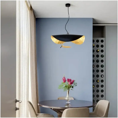 Decorbites led saucer pendant light featuring a sleek black and gold leaf design for modern living rooms