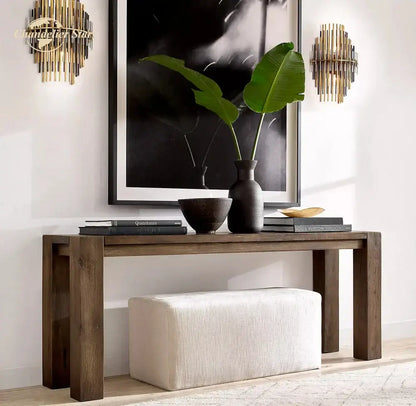Dark brown wooden console table with textured white fabric ottoman below decorbites led sconce lamp wall lighting