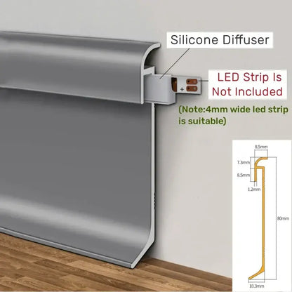 Gray silicone decorbites led skirting baseboard trim with curved profile and integrated bracket for led strip lighting