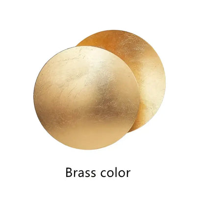 DecorBites led solar eclipse wall lamp features two overlapping brass discs with a textured surface for modern indoor lighting