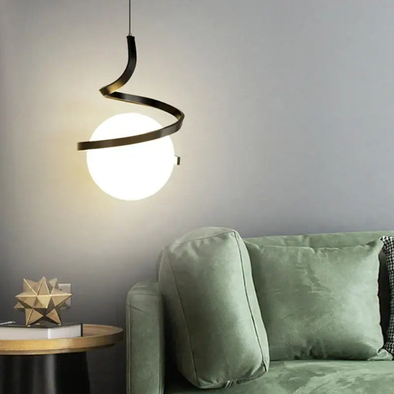 Modern black metal decorbites led spiral pendant light with a glowing white glass shade for living room lighting