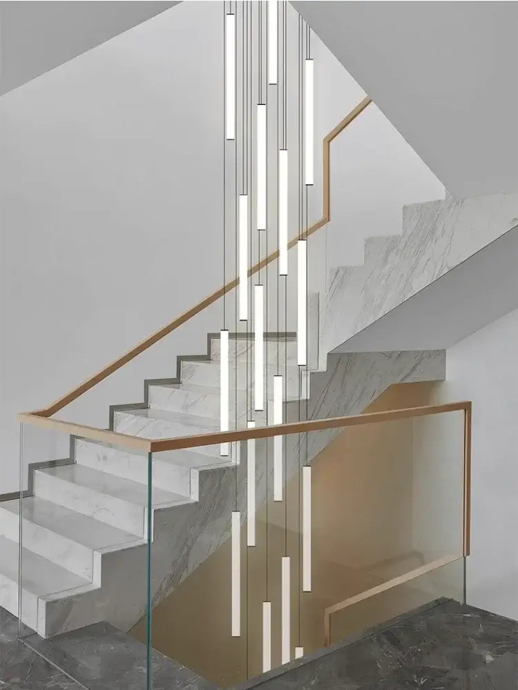 Modern minimalist spiral staircase with white marble steps glass balustrade and wooden handrail with led spiral staircase chandelier