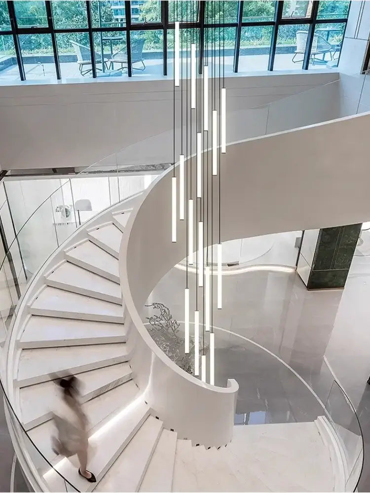 Modern white spiral staircase with glass railings featuring decorbites™ led spiral staircase chandelier for living room