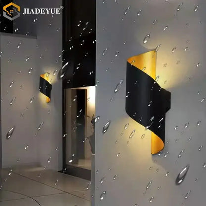 Black and gold twisted decorbites led spiral wall sconce with sleek modern design for outdoor use