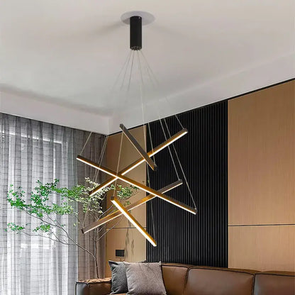 Decorbites led stair chandelier with modern gold-toned metal rods and black cylindrical ceiling mount for indoor lighting