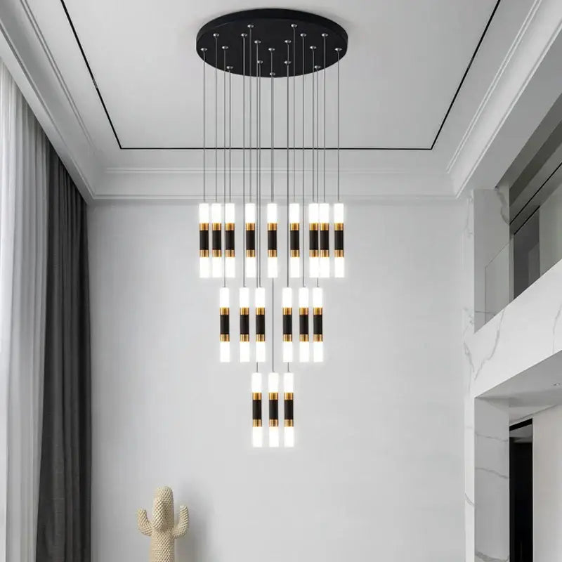 Modern black and gold cylindrical led staircase chandelier with circular ceiling mount for duplex home lighting