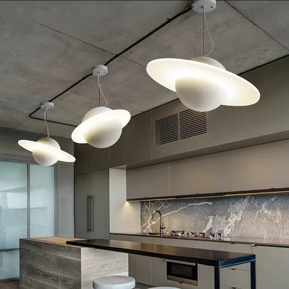 Three white planet-inspired pendant lights with glossy finish in decorbites led staircase chandelier for living room decor