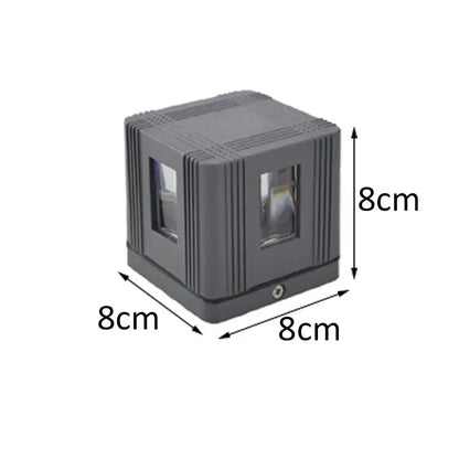 Gray 8cm cube-shaped laser level with two windows featured with decorbites led starlight wall lamp for versatile use