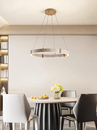 Modern circular led stone ring chandelier by decorbites with metallic textured ring and wooden ceiling mount for living room